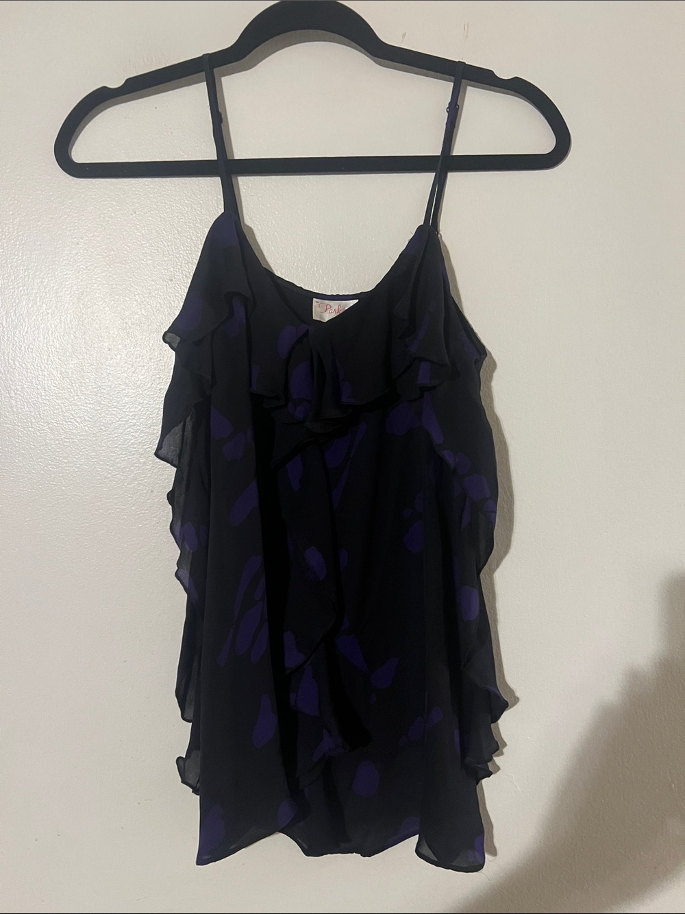 Parker 100% silk black w/purple sleeveless top. Adjustable straps. Ruffle detail